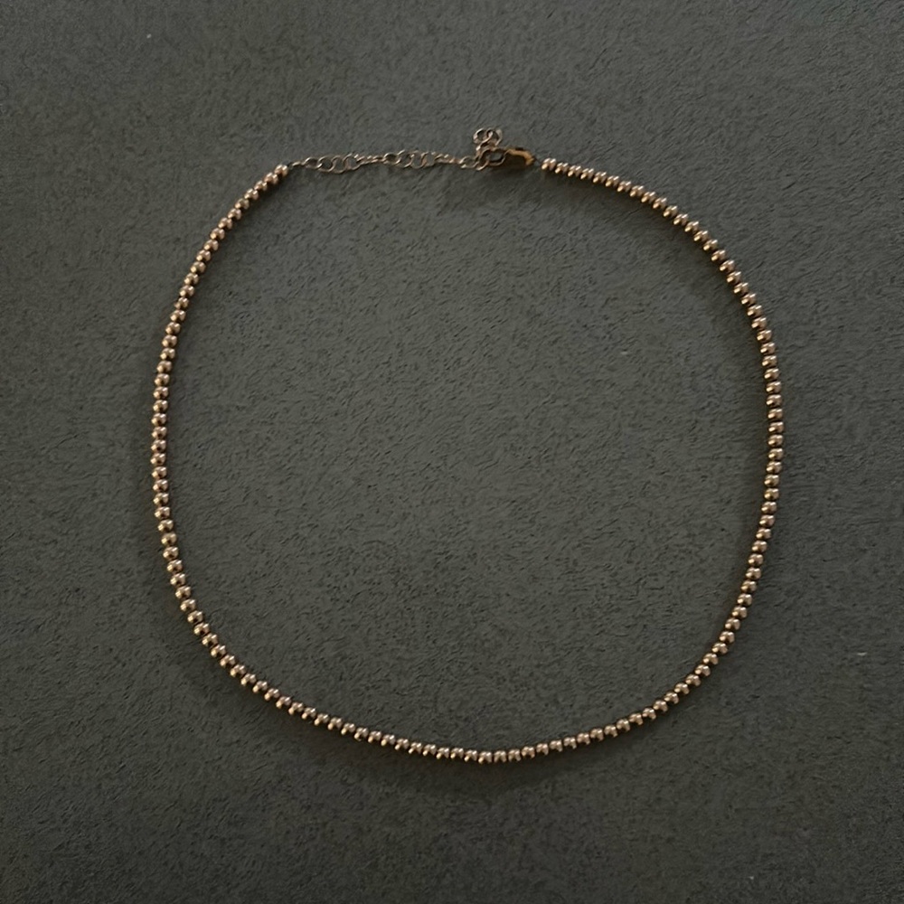 Karen Lazar 3MM yellow gold necklace.